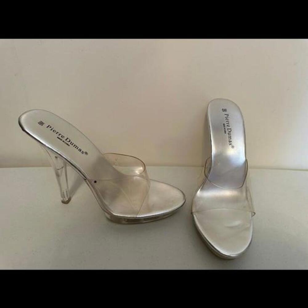Sandals thatshowcase a stunning stiletto heel that is transparent Pierre Dummas